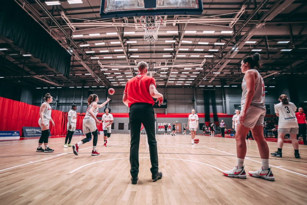 Coach Oli Parr leading the WBBL Riders team.