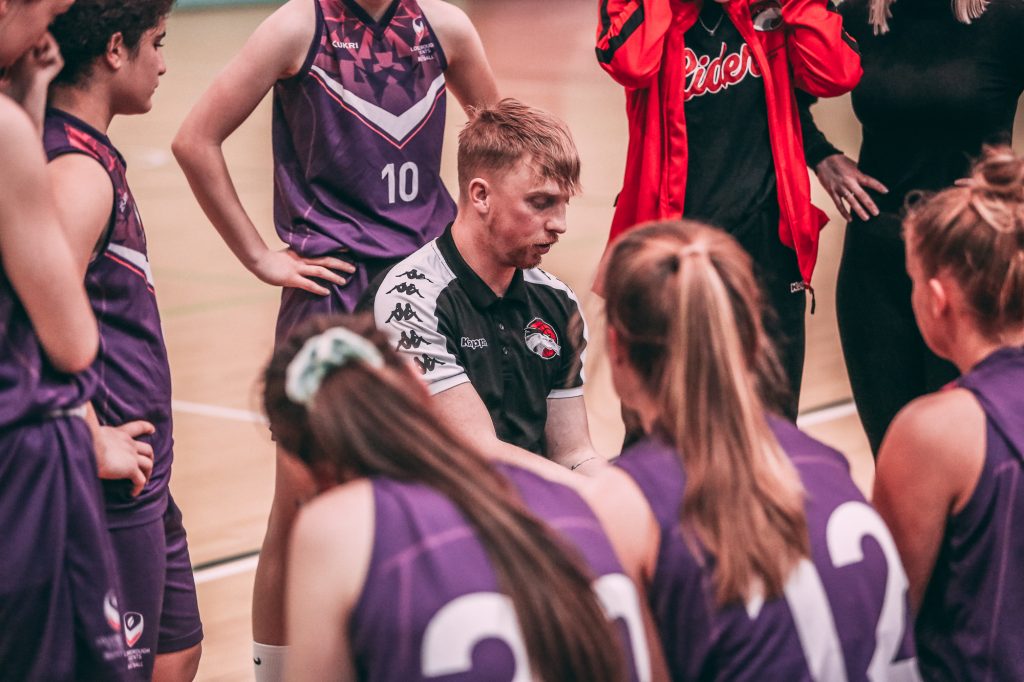 Coach Oli Parr in a timeout with the Loughborough Riders team.